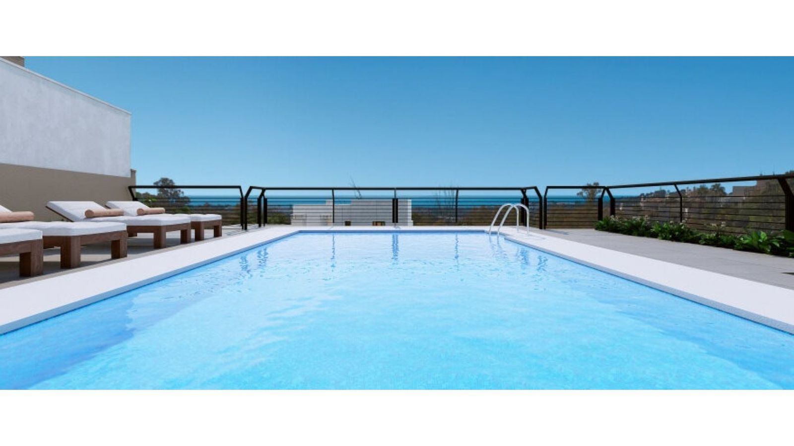 Swimmingpool mit Liegestühlen am Marbella Lake